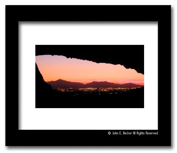 Sunset over Phoenix, Arizona, from a park cave, in the middle of the city.